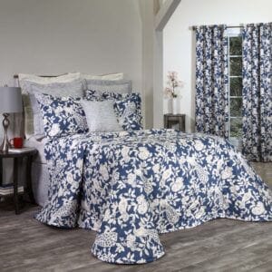 Birdsong Quilted Bedspread Only is blue with cream birds and flowers